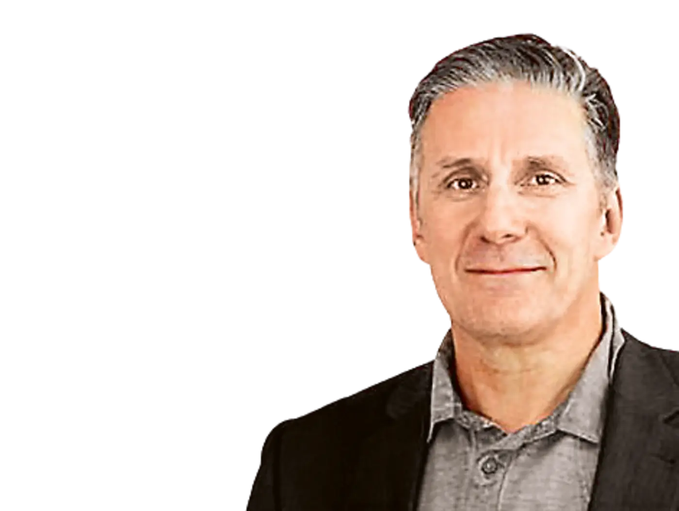 Porträt eines Mannes mit grauen, kurzen Haaren und einem leichten Lächeln. Er trägt ein schwarzes Jackett und ein graues Hemd.