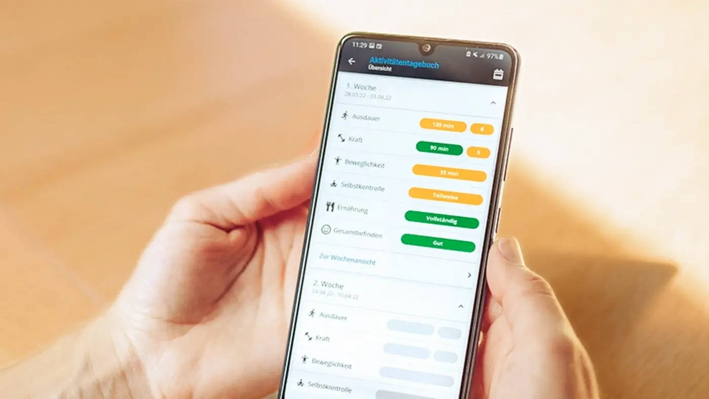 Ein Einblick in die App, die Übungen und Fortschritte online anzeigt.